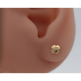 Boucles d'oreilles or jaune 750/1000 et zirconiums "fleurs"
