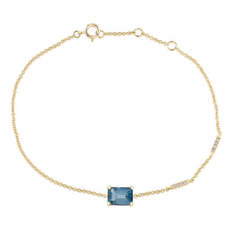 Bracelet or jaune 18 carats, topaze blue London et diamant