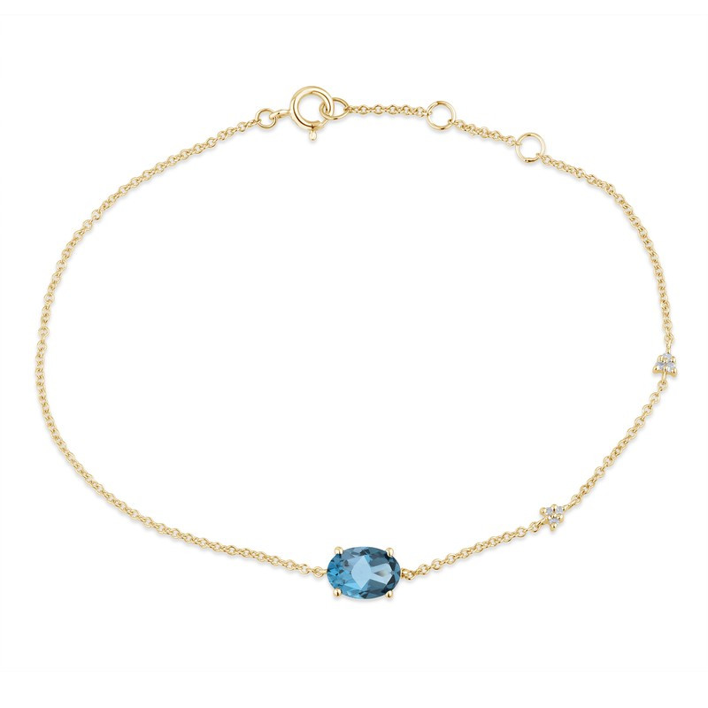 Bracelet or 18 carats, topaze Blue London et diamant