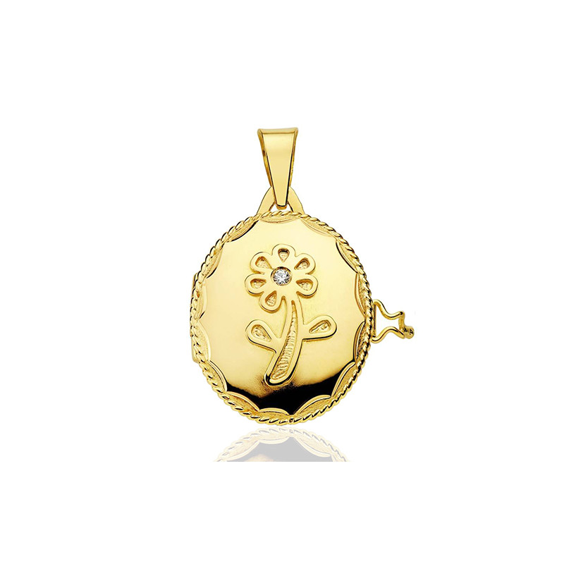Pendentif cassolette or 18 carats et zirconium