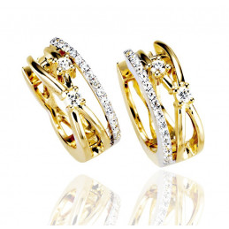Boucles d'oreilles or jaune et or blanc 18 carats et diamant 0,28 carat