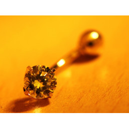 Piercing nombril or jaune 18 carats et zirconia