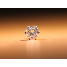 Boucle d'oreille zirconium et or gris 750/1000 six griffes